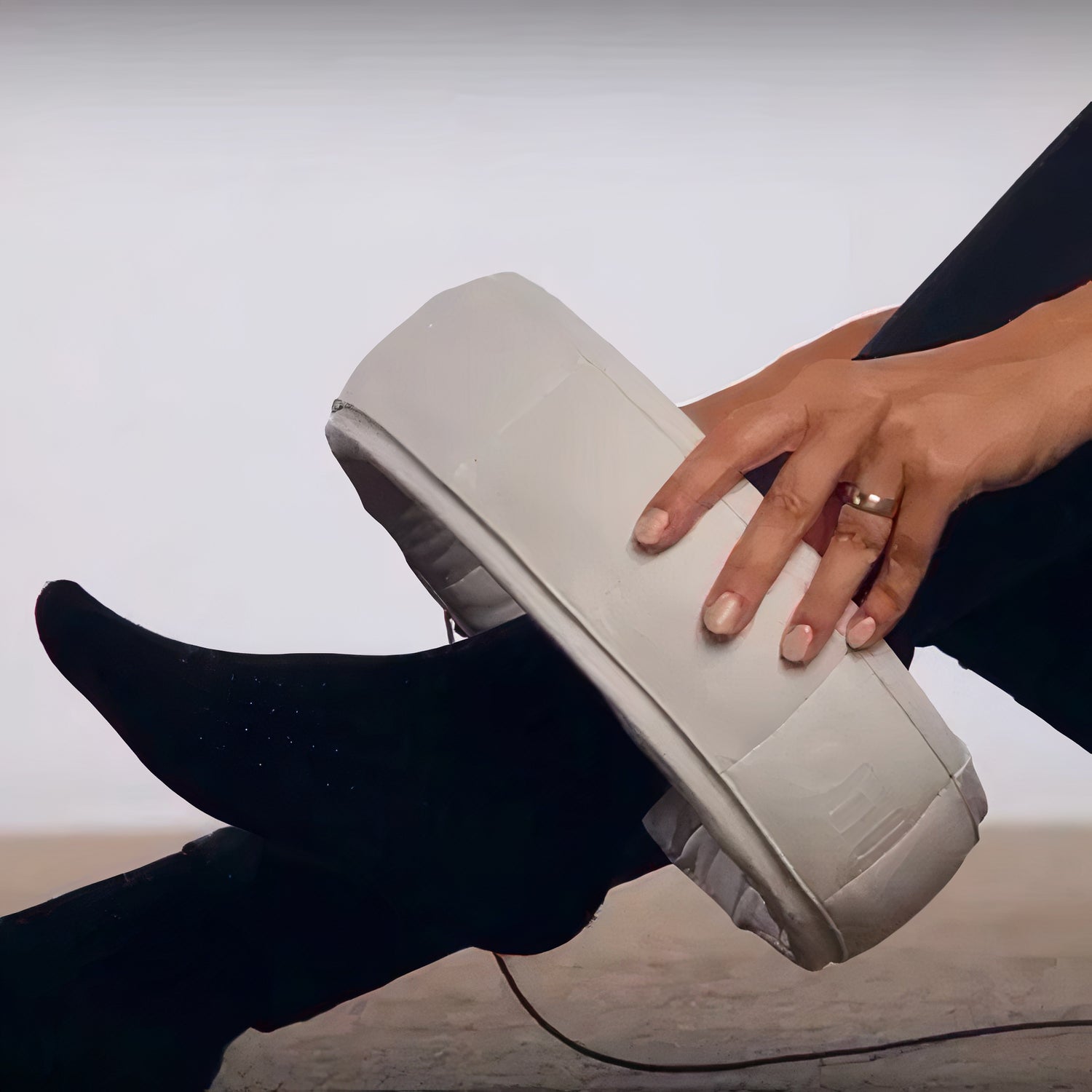 pemf machine power band around the ankle of a girl in the uk