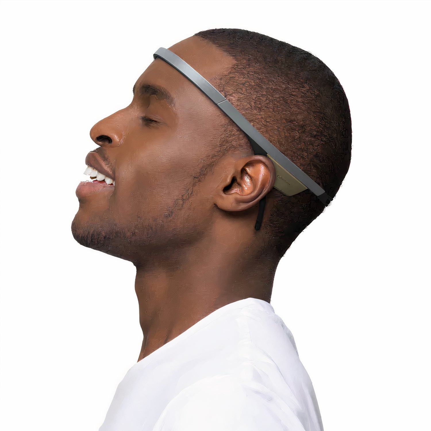 Man wearing a flowtime eeg headset smiling