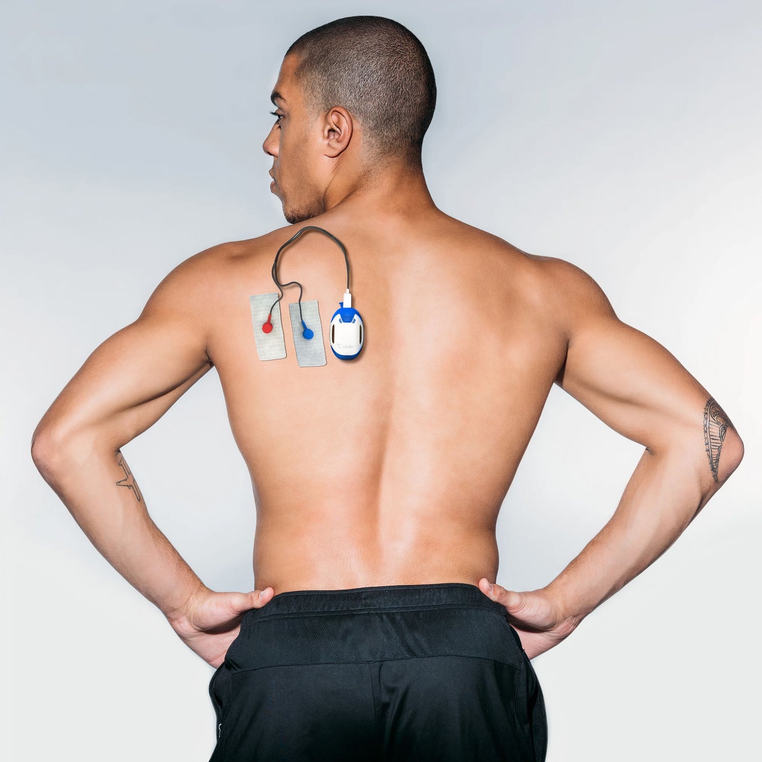 Man wearing a callibri sensor on his back