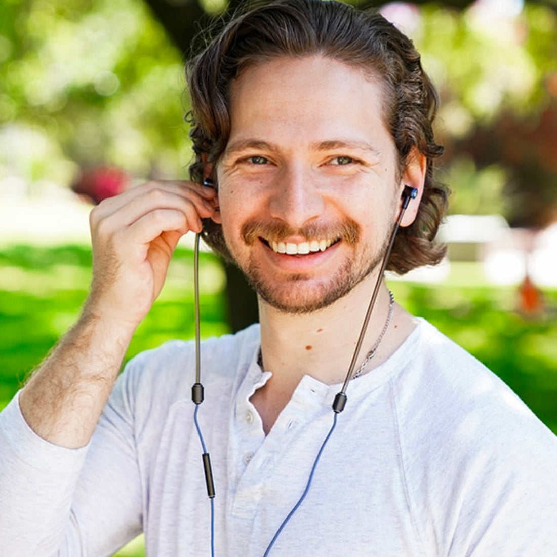 Wearing the DefenderShield Air Tube earphones